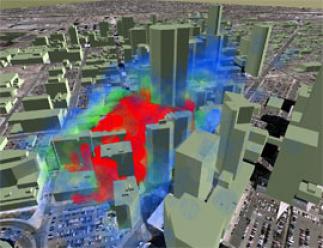 A simulated plume of hazardous material hypothetically released into the atmosphere in Denver, Colorado about five minutes before the time of the image. Building–aware winds were calculated using a large–scale wind as input to the LANL QUIC–URB software package. The transport and diffusion of the plume were calculated by LANL's QUIC–PLUME software. The opaque red color indicates the highest concentrations, and the translucent green and blue show lesser values.