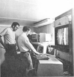 John McCarthy (left) and Jim Wilson monitor radar signals from the JAWS control center east of Lafayette. Photo courtesy Charles Semmer.