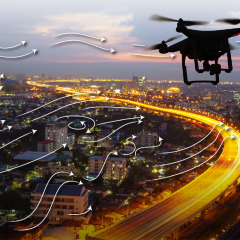 drone over city with winds
