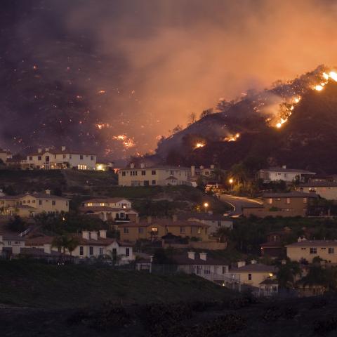 Hillside neighborhood in California engulfed in a wildland fire