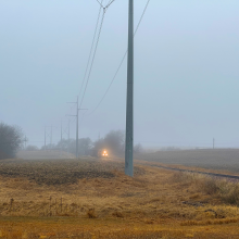 Train traveling in heavy fog