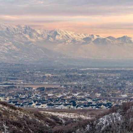 Stunning Wasatch Mountains and Utah Valley with houses dusted with winter snow - SNOWSCAPE Project