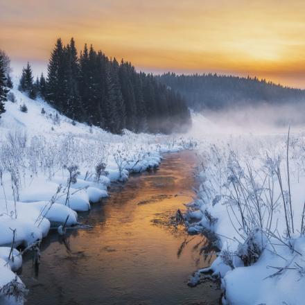 Landscape river winter seasonal view water snow forest in mountains sunset