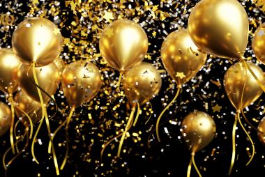 Gold balloons with foil confetti falling on black background 3d render